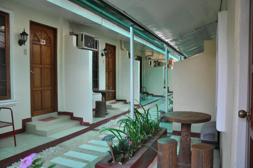 D'Lucky Garden Inn & Suites Tiniguiban Quarto foto
