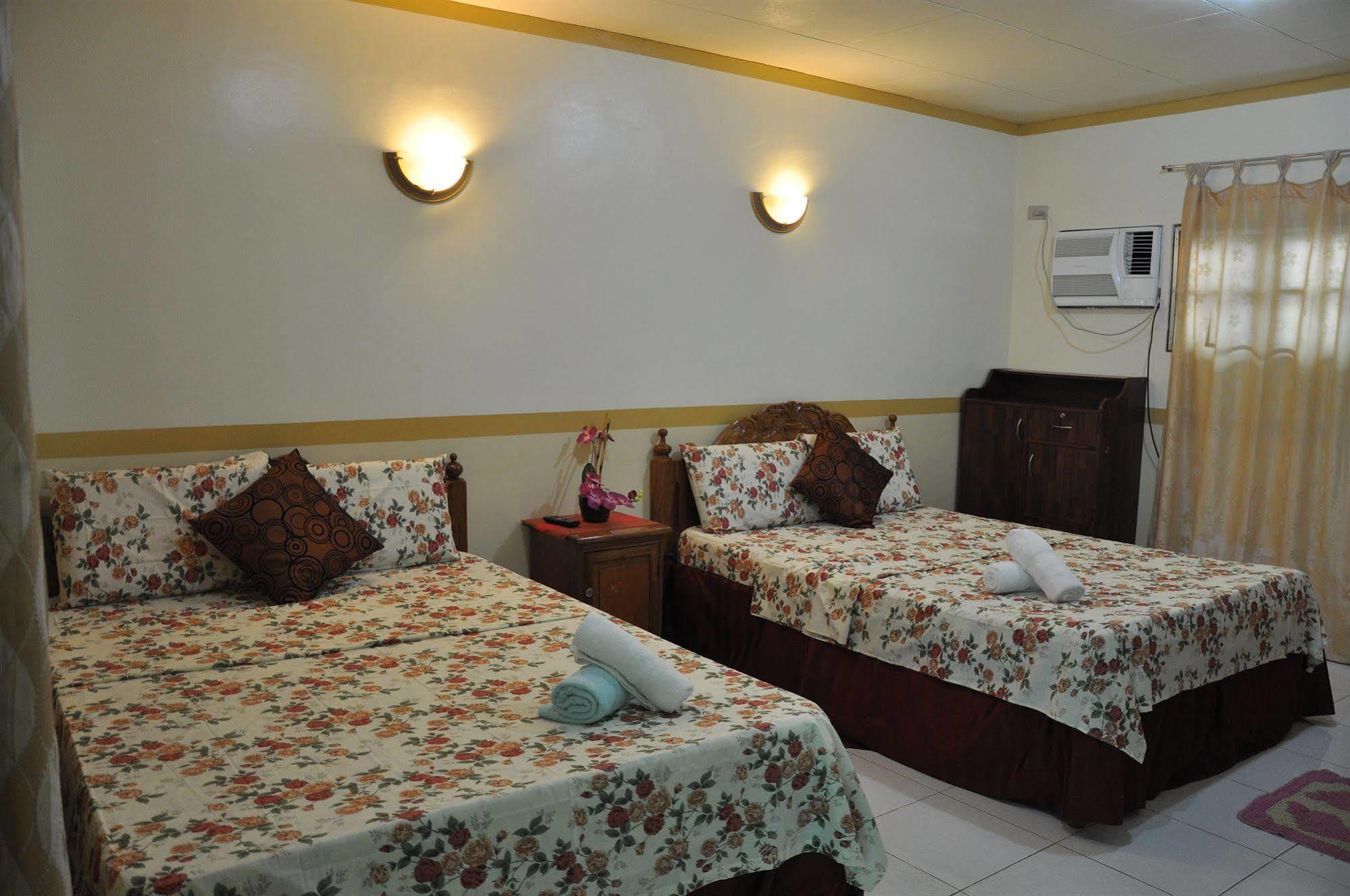 D'Lucky Garden Inn & Suites Tiniguiban Exterior foto