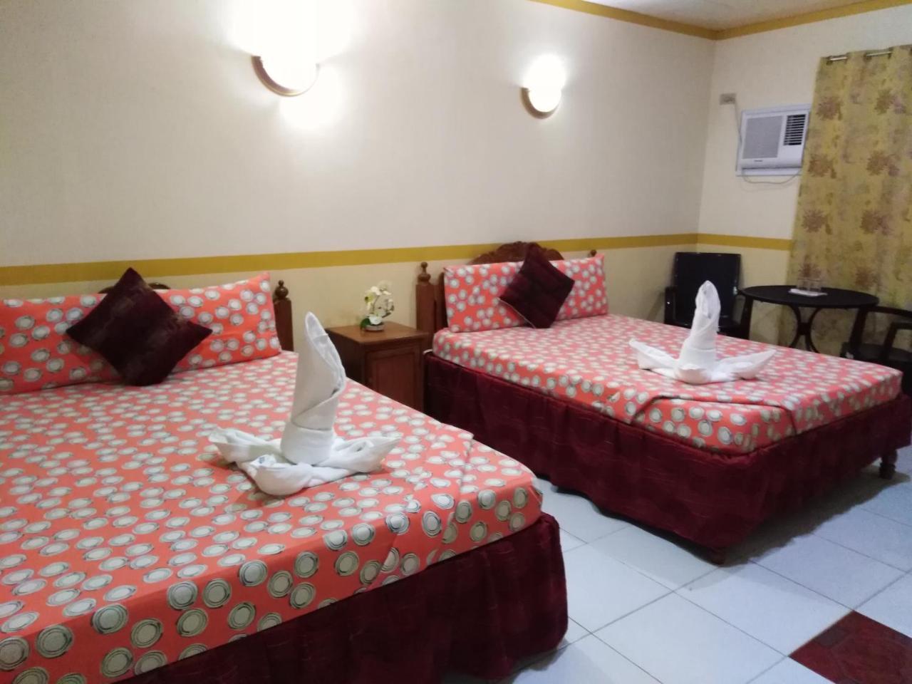 D'Lucky Garden Inn & Suites Tiniguiban Exterior foto
