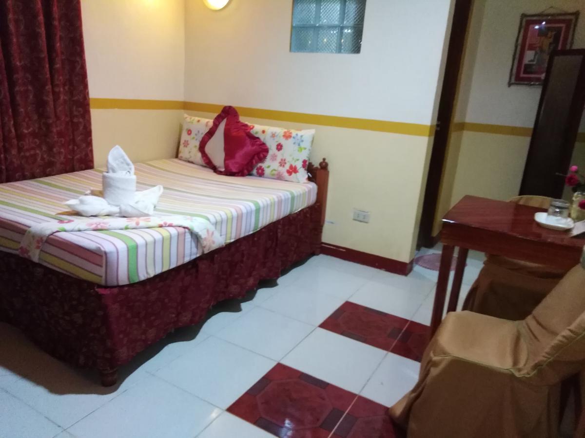 D'Lucky Garden Inn & Suites Tiniguiban Exterior foto
